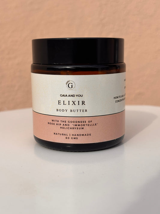 Image of a bottle of Elixir body butter made with rose hip and helichrysum with shea butter, mango butter, and kokum butter.